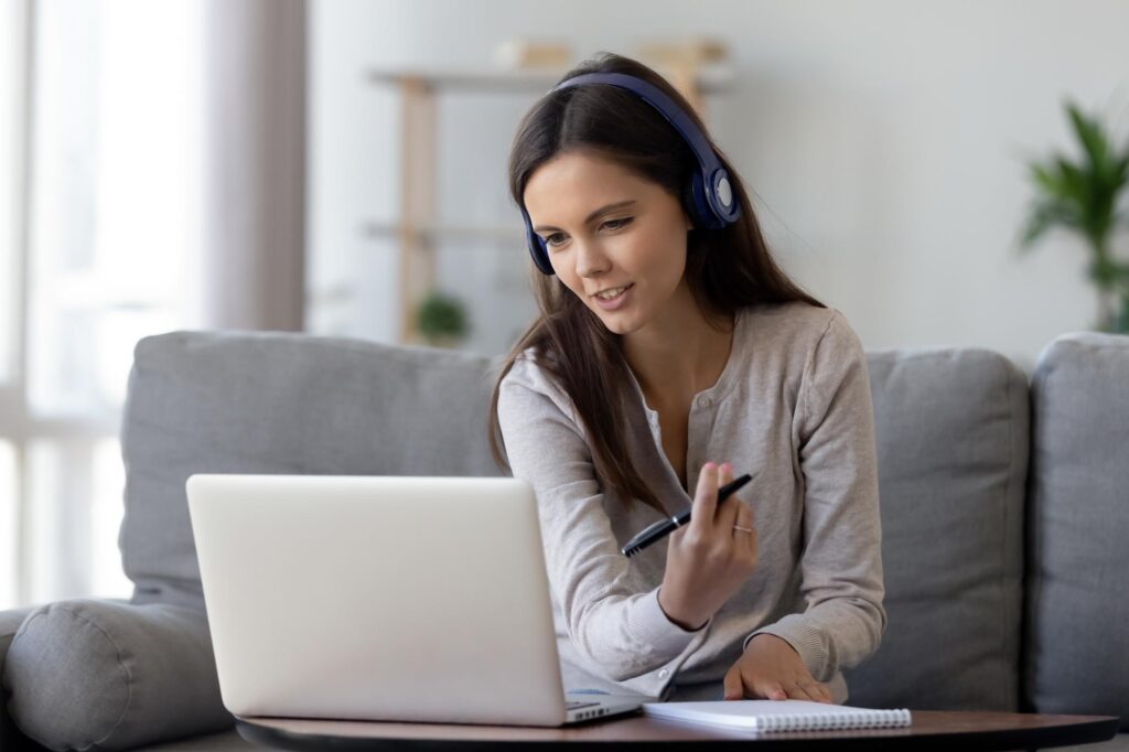 Woman working with headphones