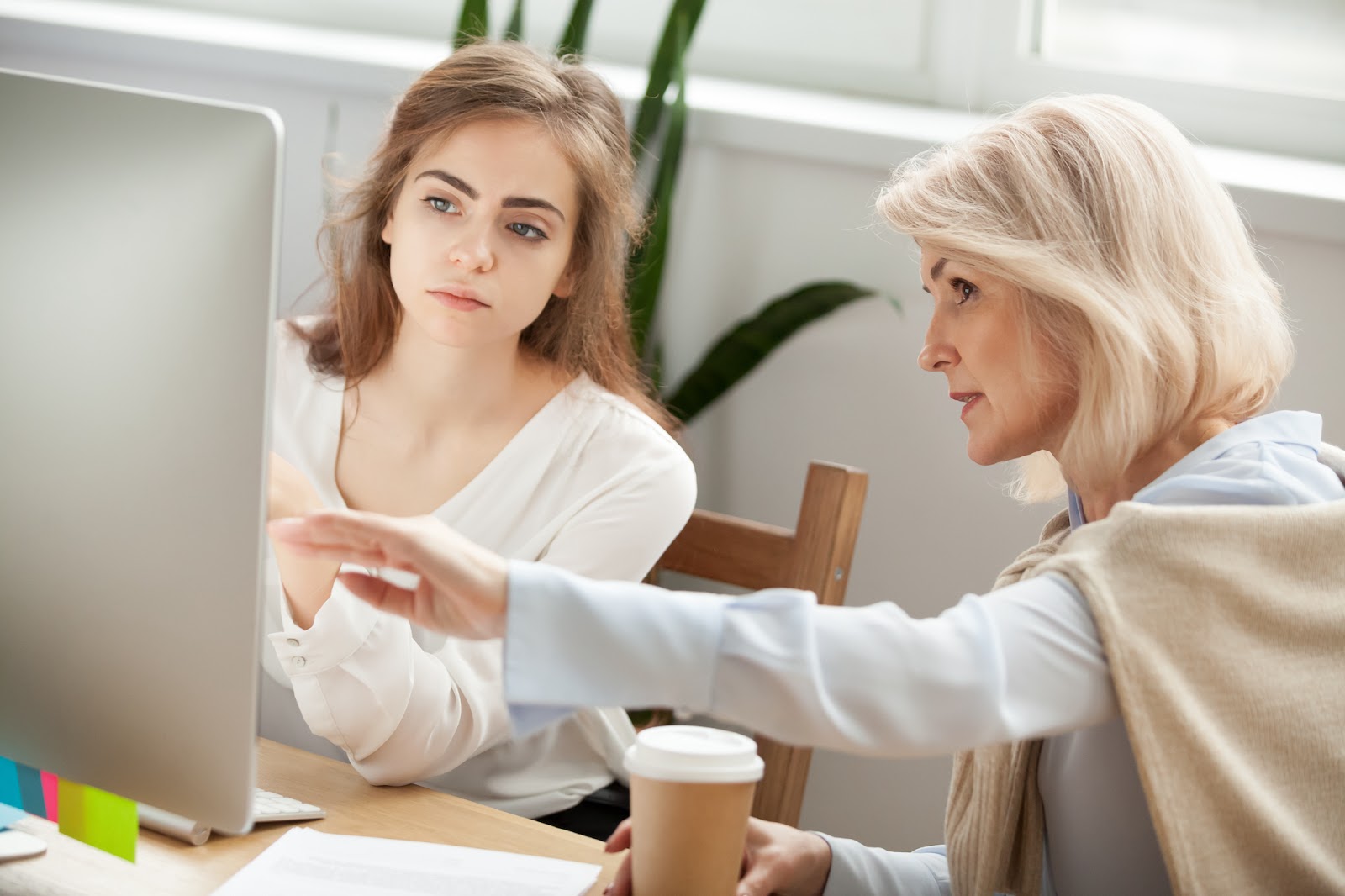 Businesswoman mentoring another businesswoman