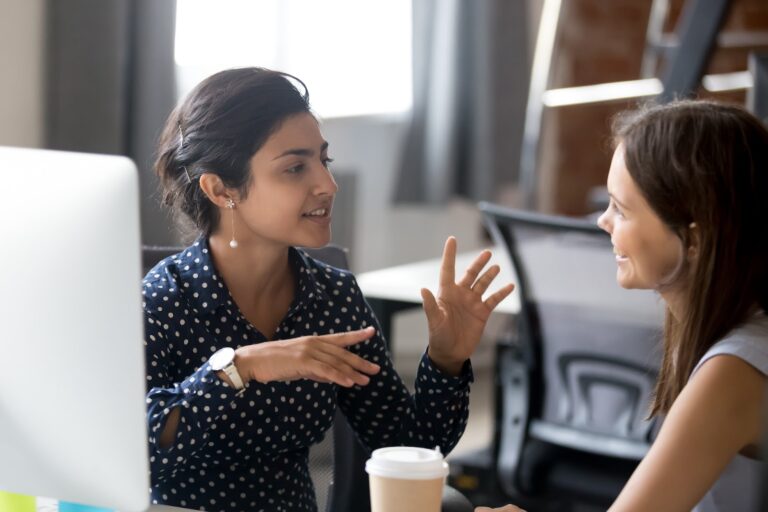 Two colleagues communicating