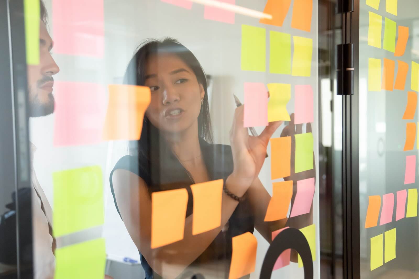 Strategic planning consultant presenting on a board