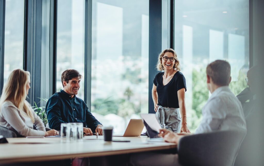 a group of people in a meeting